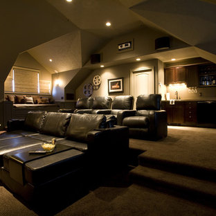 Home theater - traditional brown floor home theater idea in Denver
