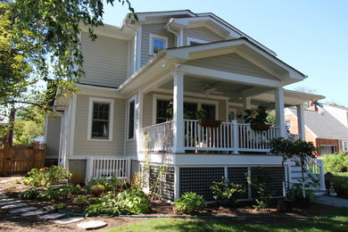 Large elegant beige three-story mixed siding exterior home photo in DC Metro