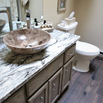 Guest Bathr Remodel with Granite Countertops and Wood Plank Flooring