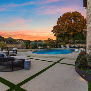 Custom Outdoor Living Pool Deck with Stamped Concrete & Turf