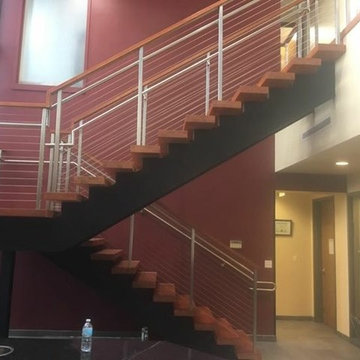 Double steel stringer open risers and cable railing