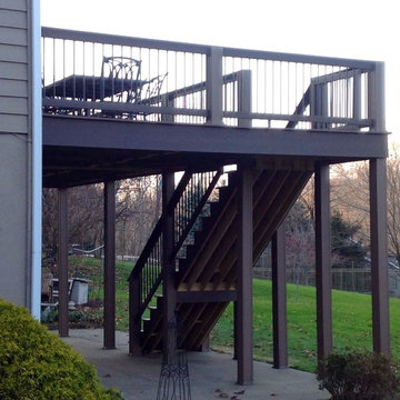 AZEK Deck with Timbertech Builderrail and Genovations Brownstone post wraps