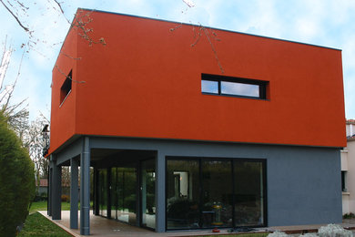 Réalisation d'une façade de maison design.