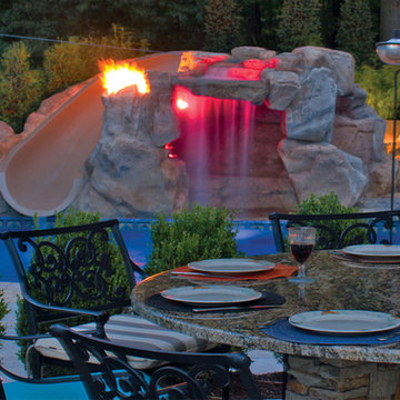 Swimming Pool with Slide, Fire Effect and RicoRock Custom Grotto