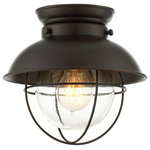 Trade Winds Lighting - Trade Winds Lakeshore Semi-Flush Mount Ceiling Light in Oil Rubbed Bronze - Bring seaside style to any space with this Trade Winds Lakeshore flush mount ceiling light. It offers a thoughtfully-detailed coastal look with a thin wire cage and clear seeded glass shade protecting the light source. Finished in oil rubbed bronze. Thanks to Lakeshore’s close-to-ceiling style, it is ideal for lighting up many different rooms, especially smaller ones. This fixture is dimmable and uses 1 standard size bulb of up to 60 watts. An LED bulb can be used. Rated for indoor use only.  This light requires 1 , 60 Watt Bulbs (Not Included) UL Certified.