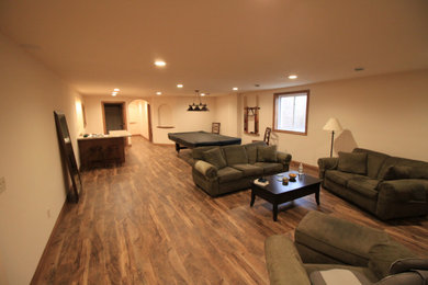 Basement - mid-sized traditional vinyl floor basement idea in Other