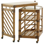Tommy Bahama Home - Cable Beach Bar Cart - Perhaps the most innovative design in the collection, the mobile bar cart features a white Cordova stone top which is hand polished and sealed. The lower portion, which is on antique brass casters, pivots 360 degrees around the end post offering unlimited positioning for serving guests. The pivoting section features a tempered glass top, stationary wooden shelf below for glassware and a bottom shelf with gallery surround for beverage storage. When closed, the opposing diagonal design on the end panels creates a distinctive herringbone pattern.