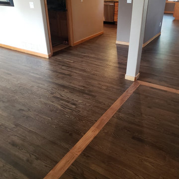 Hardwood Elegance with Custom Inlays & Entry Border
