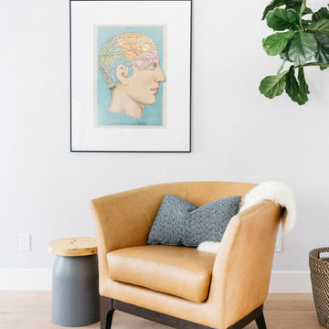 Vintage Aqua Poster with Caramel Leather Chair