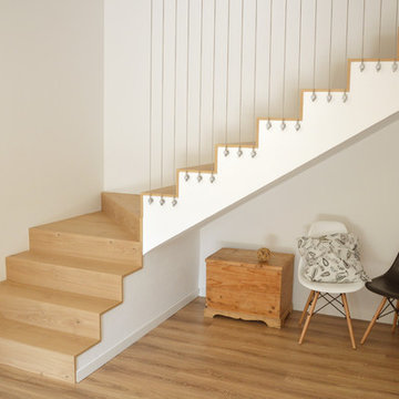 Scala in rovere realizzata con tavole da pavimento