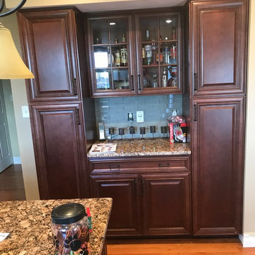 Kitchen remodel--maple capinets with granite and glass backsplash