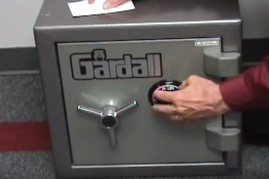 Open a combination safe lock