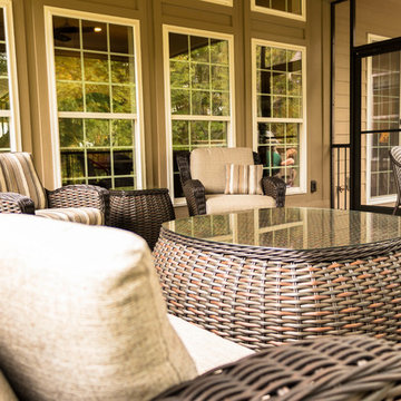 Screen Room Addition with Retractable Screens, Outdoor Kitchen, and Patio