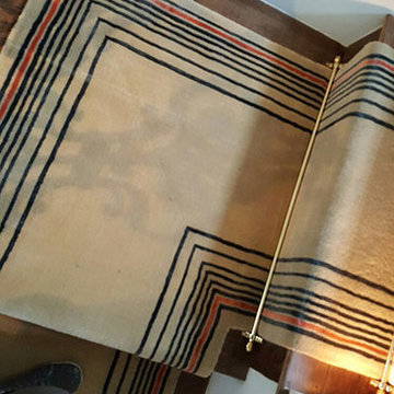 Beige Carpet Installation With Some Stripes to Stairs