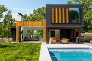 Inspiration for a contemporary multicolored two-story mixed siding exterior home remodel in Minneapolis