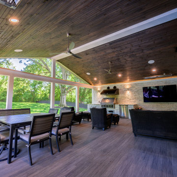 Screen Room with Stone Fireplace and Cooking Station