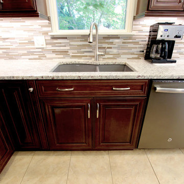 Waypoint Cherry Chocolate Cabinets and Giallo Ornamental Granite Countertops