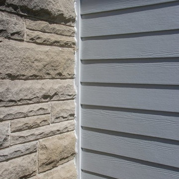 Cool blue house! James Hardie Siding installation in Light Mist