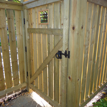 View from inside entry gate Dark Bronze Ring Latch and Flat Bar Fish Tail Grille