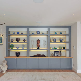 This is an example of a modern home office and library in London.