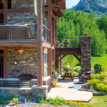 Covered decks, open terraces, dual outdoor fireplaces