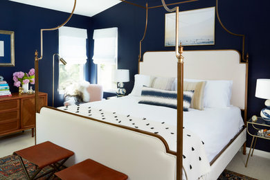 Example of a mid-sized eclectic bedroom design in Los Angeles with blue walls