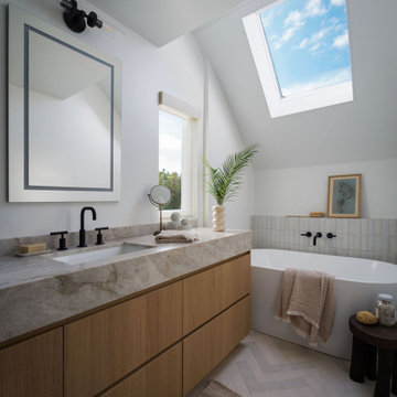 Organic Modern Bathroom with Skylight and Soaking Tub | Corona del Mar