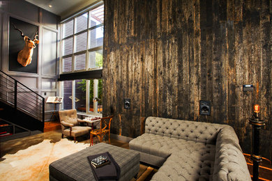 Large urban living room photo in Los Angeles with brown walls