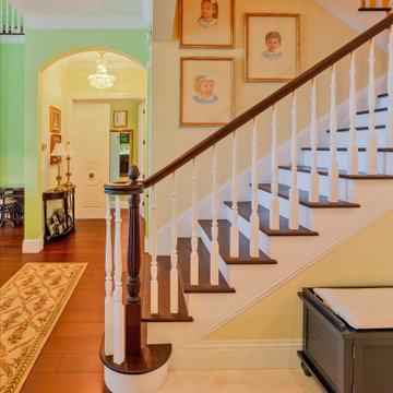 Grand Custom Staircase With Classic Wood Detailing and Elegant Design