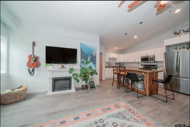 Mid-sized cottage living room photo in Other