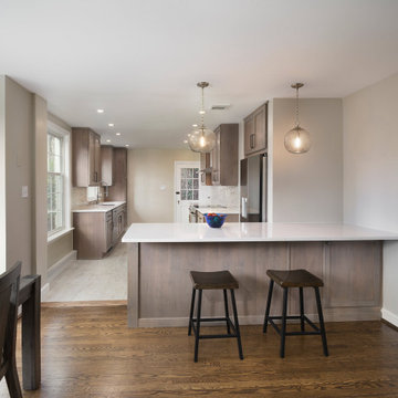 Warm Modern Transitional Kitchen| Natural Wood Cabinets, Quartz Peninsula