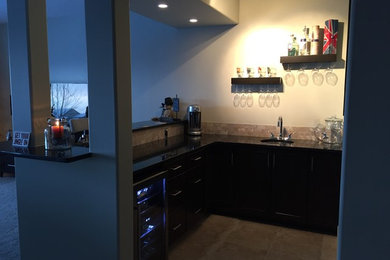 Example of a trendy home design design in Calgary