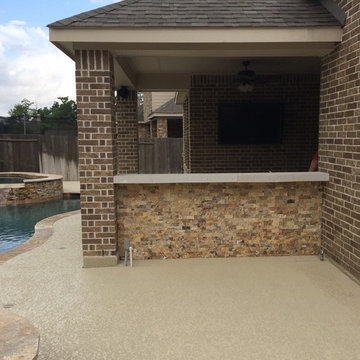 Houston Outdoor Kitchen With Traeger Grill and Scabos Split Face Stone
