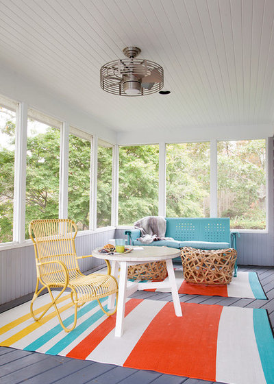Eclectic Sunroom by Abaca Interiors