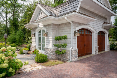 French country garage photo in Milwaukee
