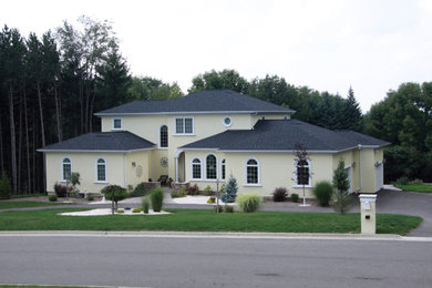 Example of a tuscan home design design in New York
