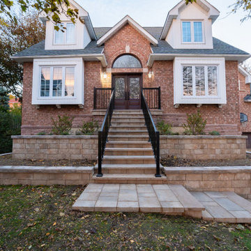 Custom Front Entrance Stonework & Retaining Wall Landscape Design