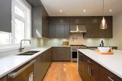 Example of a mid-sized minimalist kitchen design in Vancouver