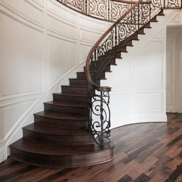 Project #74 | Circular Staircase with Hand-Forged Metal Panels