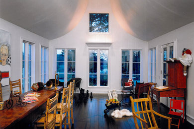 Example of a mountain style boy dark wood floor kids' room design in Chicago with white walls