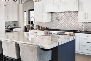 Inspiration for a transitional kitchen remodel in New York with an island