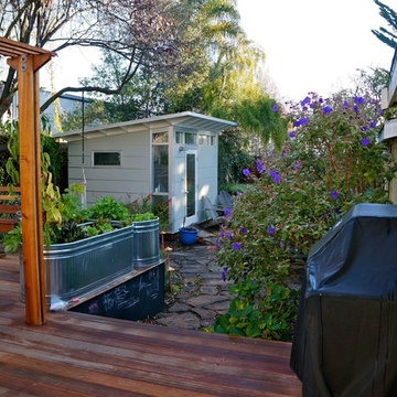Modern Home Office plays nice with Traditional storage shed