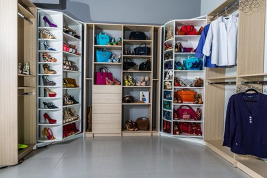 Transitional closet photo in Miami