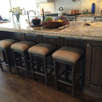 Schuler Cabinetry - Sheffield Door in Divinity Paint and Eagle Rock Island