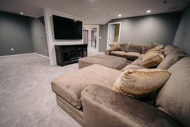 Example of a classic family room design in Cedar Rapids