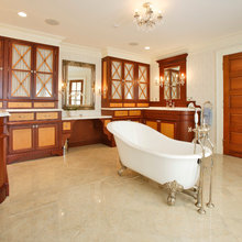 clawfoot tubs and tiled showers