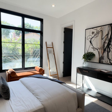 Light-Filled Guest Bedroom with Oversized Art Wall - Studio City
