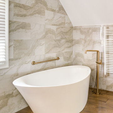 Bath Suites – A Study in Light, Material, and Proportion