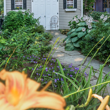 Small front yard design with shade garden out back