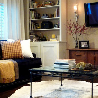 Medium sized rural living room in Phoenix with brown walls, dark hardwood flooring, a wall mounted tv and brown floors.